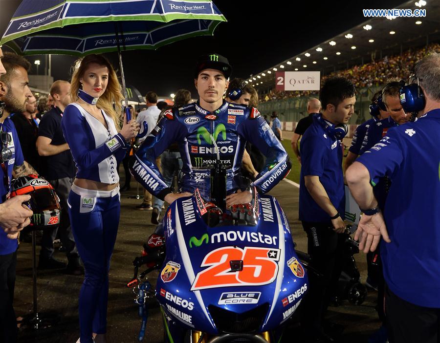 Movistar Yamaha MotoGP's Spanish rider Maverick Vinales looks on ahead of the final race of the 2017 FIM MotoGP Grand Prix of Qatar at the Losail International Circuit in Doha, capital of Qatar, on March 26, 2017. 