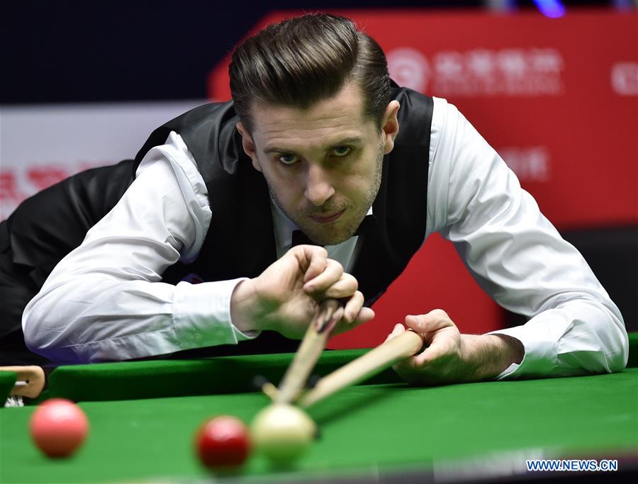 Mark Selby of England competes during the heldover match of 2017 World Snooker China Open Tournament against Adam Stefanow of Poland in Beijing, capital of China, March 27, 2017. Mark Selby won 5-3. (Xinhua/Zhang Chenlin) 