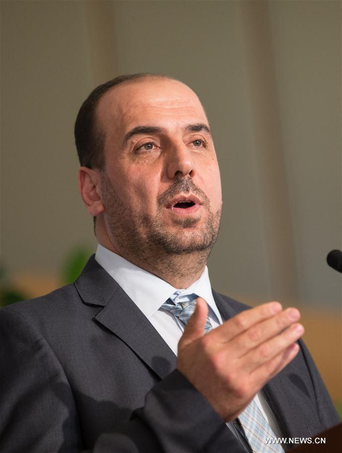 Syria's opposition delegation leader Nasr al-Hariri holds a press conference after meeting with the UN Special Envoy for Syria Staffan de Mistura in Geneva, Switzerland, on March 28, 2017. (Xinhua/Xu Jinquan) Syria's opposition delegation leader Nasr al-Hariri holds a press conference after meeting with the UN Special Envoy for Syria Staffan de Mistura in Geneva, Switzerland, on March 28, 2017. (Xinhua/Xu Jinquan)
