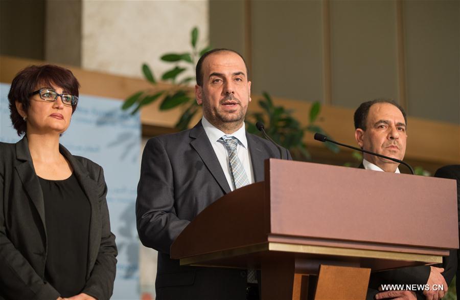 Syria's opposition delegation leader Nasr al-Hariri holds a press conference after meeting with the UN Special Envoy for Syria Staffan de Mistura in Geneva, Switzerland, on March 28, 2017. (Xinhua/Xu Jinquan) 