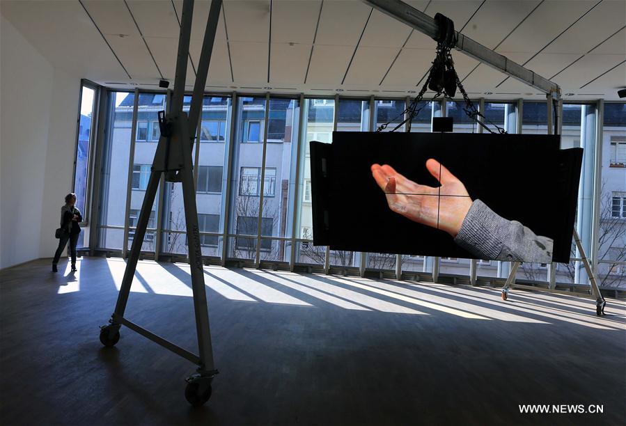 People visit the exhibition 'Ed Atkins. Corpsing' at the Museum for Modern Art in Frankfurt, Germany, March 28, 2017. People visit the exhibition 'Ed Atkins. Corpsing' at the Museum for Modern Art in Frankfurt, Germany, March 28, 2017.