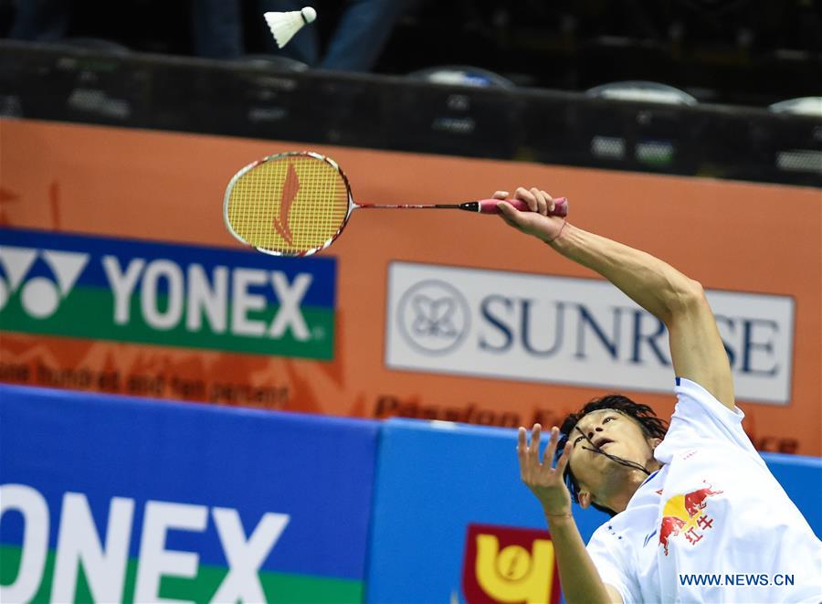 Tian Houwei of China competes during the first round of men's single against Wei Nan of Hong Kong, China in Yonex Sunrise Indian Open Badminton Championship in New Delhi, India, March 29, 2017. Tian Houwei won 2-0.
