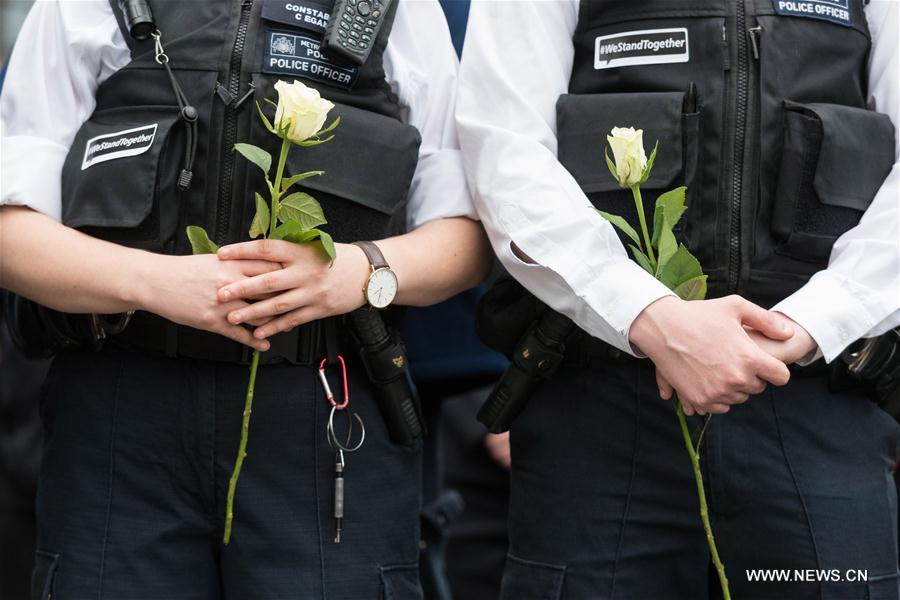 Members of muslim community attend an event on Westminster Bridge to commemorate the victims of last week's terror attacks in London, Britain on March 29, 2017.