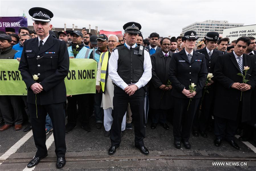 Members of muslim community attend an event on Westminster Bridge to commemorate the victims of last week's terror attacks in London, Britain on March 29, 2017. Members of muslim community attend an event on Westminster Bridge to commemorate the victims of last week's terror attacks in London, Britain on March 29, 2017.