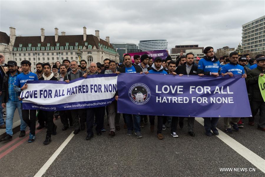 Members of muslim community attend an event on Westminster Bridge to commemorate the victims of last week's terror attacks in London, Britain on March 29, 2017.
