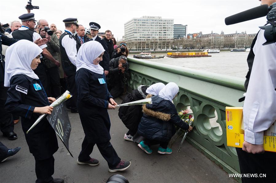 Members of muslim community attend an event on Westminster Bridge to commemorate the victims of last week's terror attacks in London, Britain on March 29, 2017.