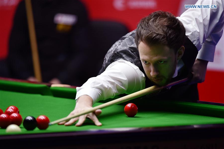 Judd Trump of England competes during the 3rd round match against Tian Pengfei of China at the 2017 World Snooker China Open Tournament in Beijing, capital of China, March 30, 2017. Judd Trump of England competes during the 3rd round match against Tian Pengfei of China at the 2017 World Snooker China Open Tournament in Beijing, capital of China, March 30, 2017.