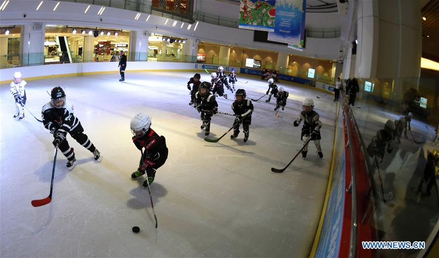 Boys play ice hockey in the Century Star Rink in Kunming, capital of southwest China's Yunnan province, March 18, 2017. Boys play ice hockey in the Century Star Rink in Kunming, capital of southwest China's Yunnan province, March 18, 2017.