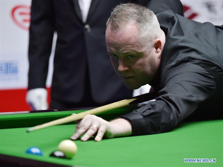 John Higgins of Scotland competes during the 3rd round match against Mark Williams of Wales at the 2017 World Snooker China Open Tournament in Beijing, capital of China, March 30, 2017. Mark Williams won 5-4. John Higgins of Scotland competes during the 3rd round match against Mark Williams of Wales at the 2017 World Snooker China Open Tournament in Beijing, capital of China, March 30, 2017. Mark Williams won 5-4.