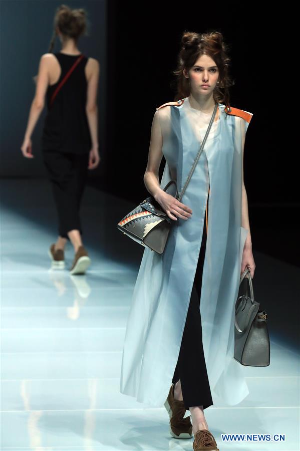 Models present accessories by designers from Xiamen during China Fashion Week in Beijing, capital of China, March 30, 2017.