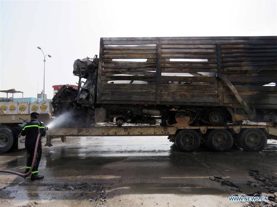 IRAQ-BAGHDAD-POLICE CHECKPOINT-SUICIDE TRUCK BOMB