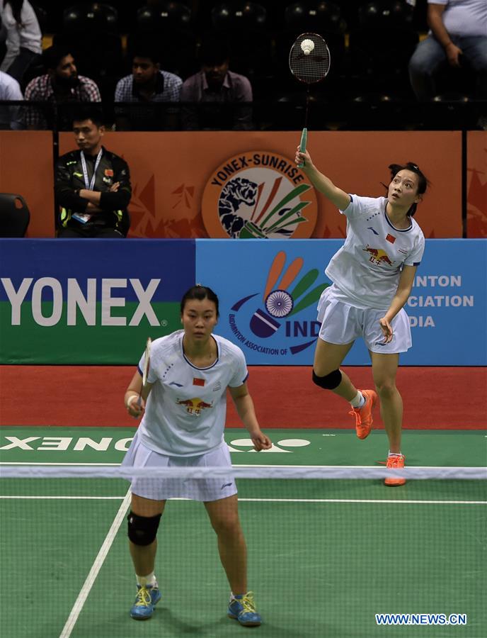 Huang Yaqiong and Tang Jinhua of China compete during the 2nd round of women's double against Lauren Smith and Sarah Walker of England in Yonex Sunrise Indian Open Badminton Championship in New Delhi, India, March 30, 2017. Huang Yaqiong and Tang Jinhua won 2-1. (Xinhua/Bi Xiaoyang) 