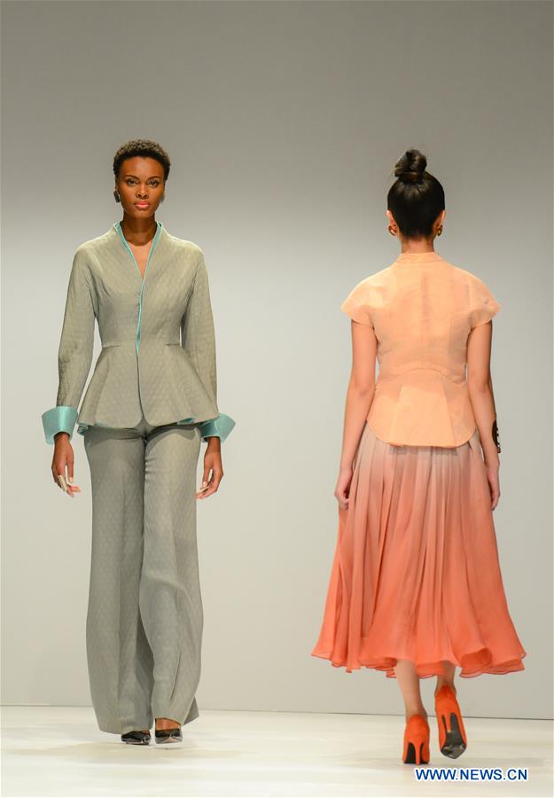 Models present creations by designer Chu Yan during South African Fashion Week Spring Summer 2017 at Hyde Park Corner in Johannesburg, South Africa, on March 30, 2017. The South African Fashion Week Spring Summer 2017 kicked off here Tuesday. Creations by more than 60 South African and international fashion designers or brands are scheduled to be presented in the five-day event. (Xinhua/Zhai Jianlan) Models present creations by designer Chu Yan during South African Fashion Week Spring Summer 2017 at Hyde Park Corner in Johannesburg, South Africa, on March 30, 2017. The South African Fashion Week Spring Summer 2017 kicked off here Tuesday. Creations by more than 60 South African and international fashion designers or brands are scheduled to be presented in the five-day event. (Xinhua/Zhai Jianlan)
