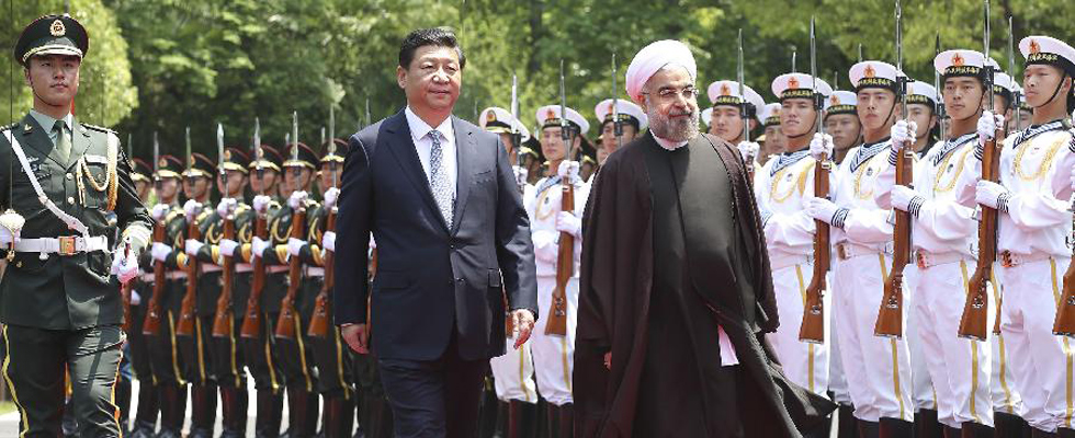 China, Iran pledge to boost ties