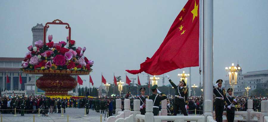Flag-raising ceremony marks 65th National Day in China