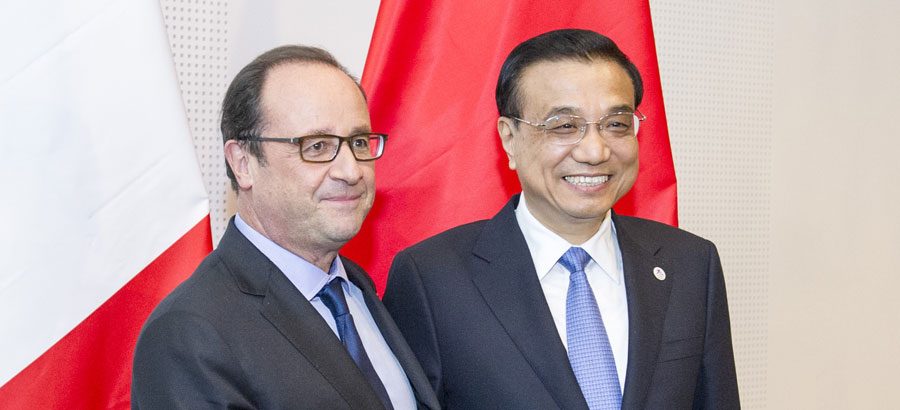 Chinese premier, French president meet on deepening ties