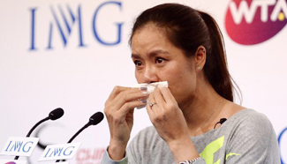 Li Na attends press conference in Wuhan after retirement announcement