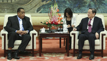 China pledges stronger exchanges with Sudan