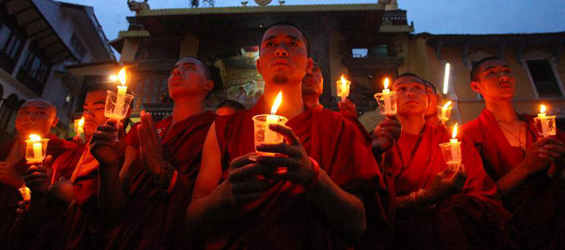 Nepalese Buddhist monks pray for earthquake victims