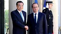 Premier Li meets French president in Paris