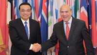 Chinese premier meets OECD secretary general