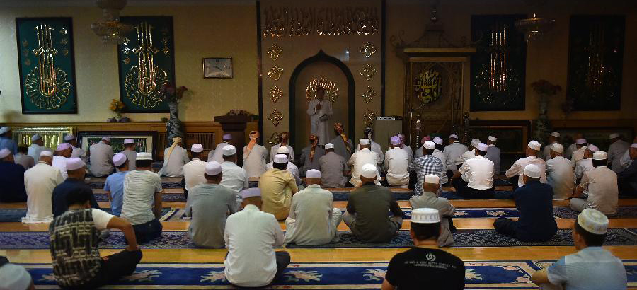 Muslims pray during holy fasting month of Ramadan in China's Ningxia