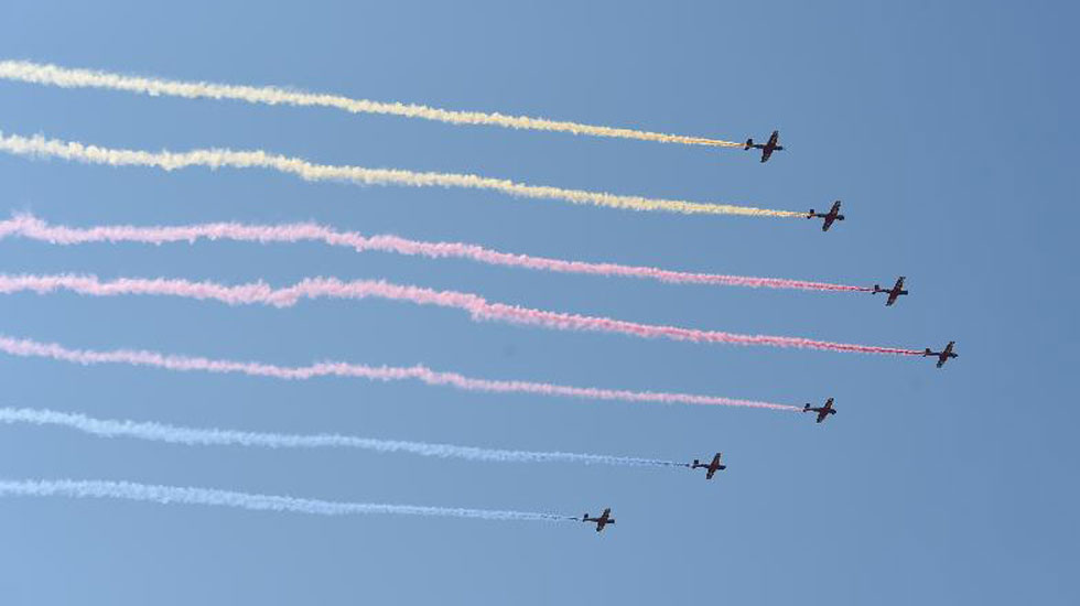 Aircraft formations parade through Beijing sky