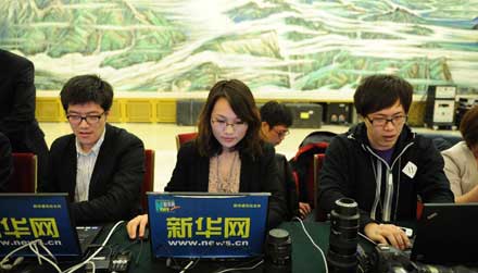 Journalists prepare to cover Premier Wen's press conference