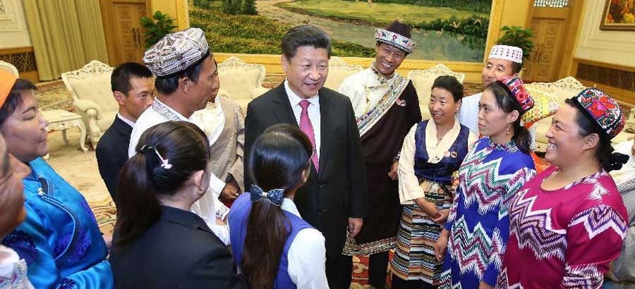 Xi celebrates National Day with ethnic minority representatives