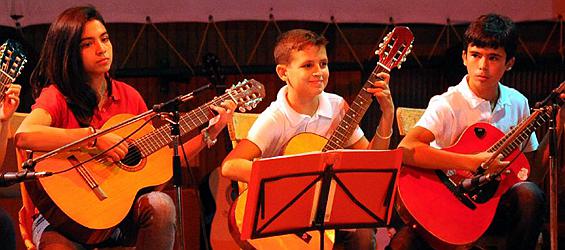 Syrian children play guitar in Damascus