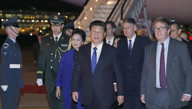 Xi arrives for UK visit, eyes "golden time" for bilateral ties