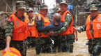 China raises emergency response level for floods as 88 confirmed dead