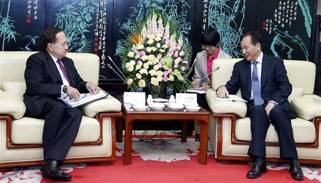 Xinhua News Agency president meets Publisher of The Hindu N. Ram in Beijing