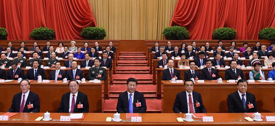 Chinese leaders attend closing meeting of 12th NPC's 4th session