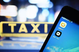 China grants legal status to ride-hailing services