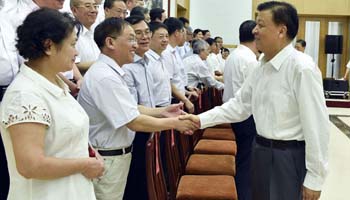 Senior CPC official cheers leading Chinese experts, scientists
