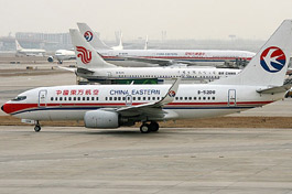 China's air market flying high, headwinds remain