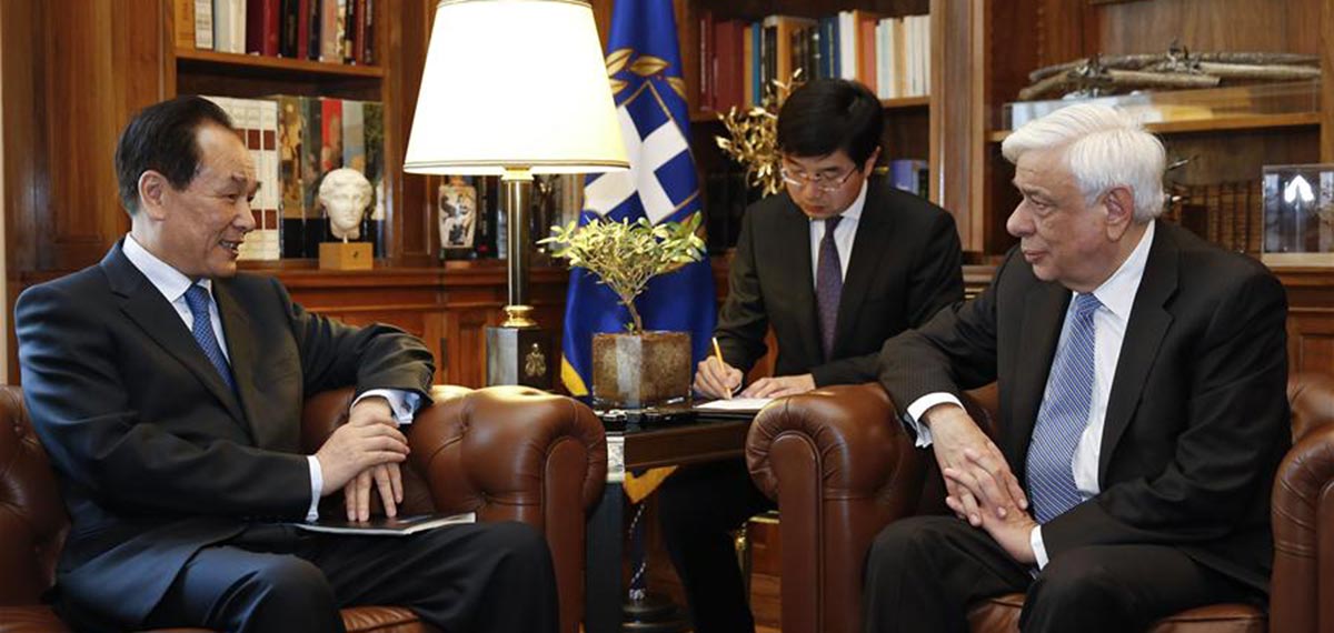 Photos: Greek president meets with Xinhua president