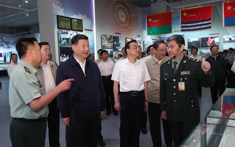 Top Chinese leaders visit military exhibition