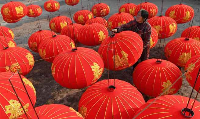 Workers prepare lanterns for upcoming new year in China's Shanxi