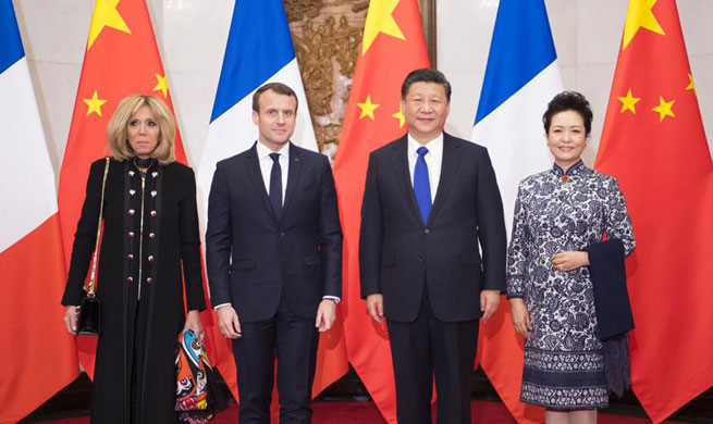 Xi meets with Macron