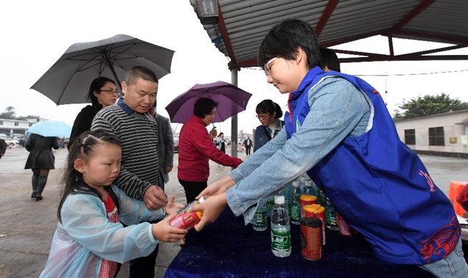 Rain adds to troubles of stranded passengers in Hainan