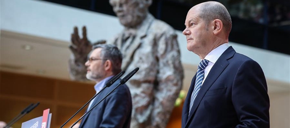 German SPD votes for government coalition with Merkel's Union