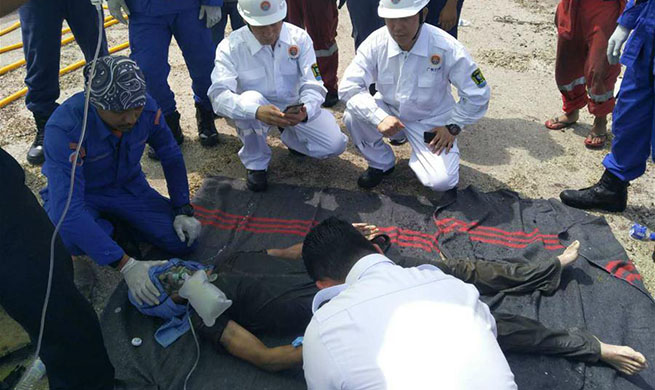 Two Chinese crew rescued from inside sand dredger capsized near Malaysia