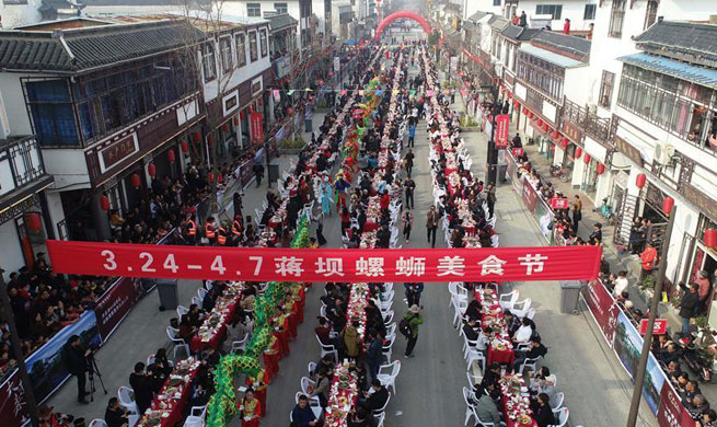 River snail gourmet festival marked in E China's Jiangsu