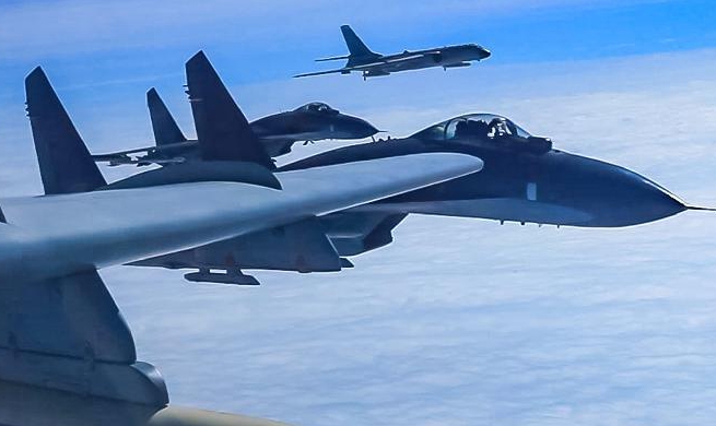 Chinese air force conducts high-sea training