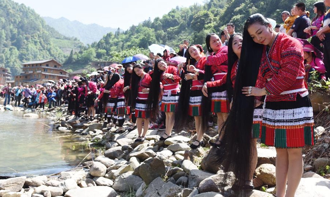"Sanyuesan" festival celebrated across China