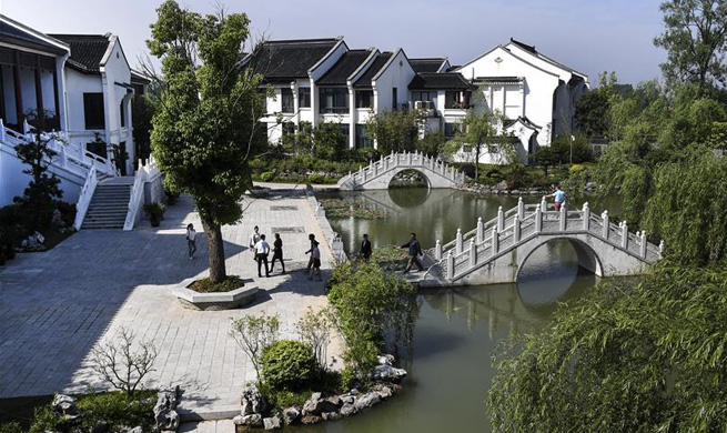 Nature-friendly small town in E China attracts tourists with idyllic scenery
