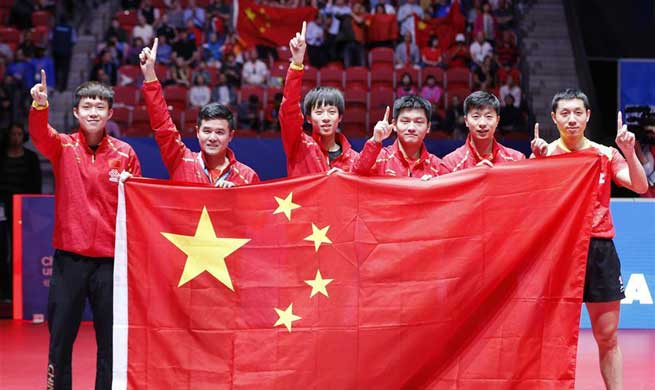 China's men's team win 9th consecutive title at table tennis worlds
