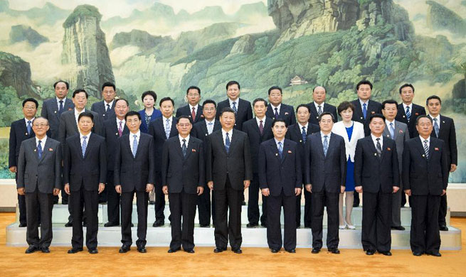 Xi meets DPRK's WPK friendship visiting group